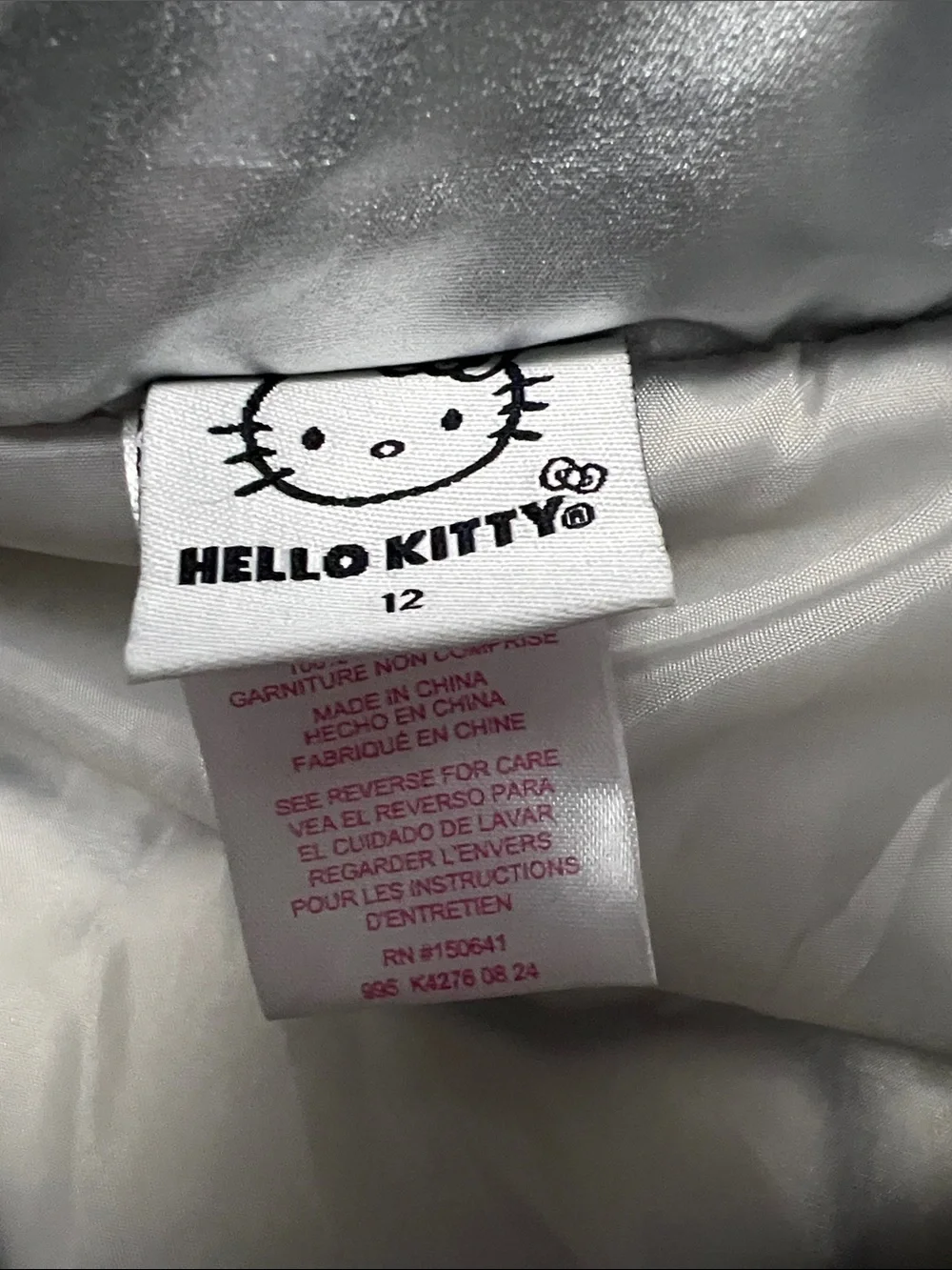 Hello Kitty Metallic Silver Quilted Puffer Vest with Pink Bow Patch